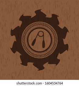hand gripper icon inside badge with wood background