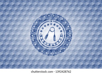 hand gripper icon inside blue emblem with geometric pattern background.