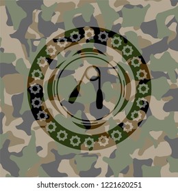 hand gripper icon inside camouflage texture