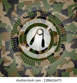 hand gripper icon inside camouflage texture