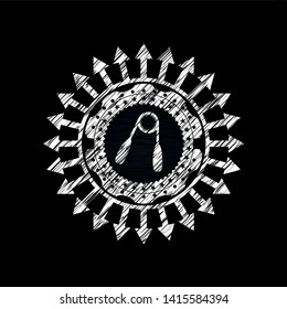 hand gripper icon inside chalkboard emblem written on a blackboard