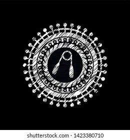 hand gripper icon inside chalkboard emblem written on a blackboard