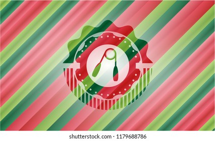 hand gripper icon inside christmas badge background.