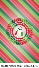 hand gripper icon inside christmas colors style emblem.