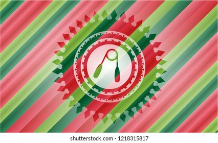 hand gripper icon inside christmas badge background.