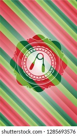 hand gripper icon inside christmas badge background.