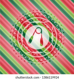 hand gripper icon inside christmas style emblem.