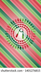 hand gripper icon inside christmas badge background.