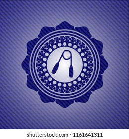 hand gripper icon inside emblem with denim high quality background