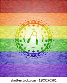 hand gripper icon inside emblem on mosaic background with the colors of the LGBT flag