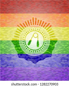 hand gripper icon inside emblem on mosaic background with the colors of the LGBT flag