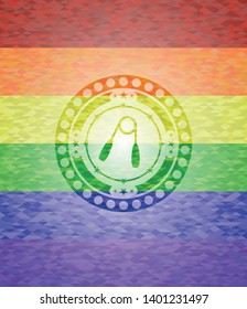 hand gripper icon inside emblem on mosaic background with the colors of the LGBT flag