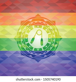 hand gripper icon inside emblem on mosaic background with the colors of the LGBT flag