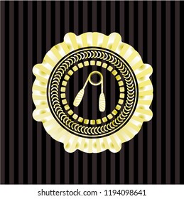hand gripper icon inside gold emblem or badge