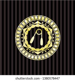 hand gripper icon inside gold badge