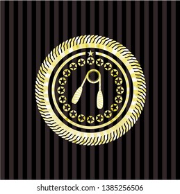 hand gripper icon inside gold badge or emblem