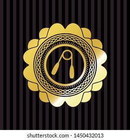 hand gripper icon inside gold emblem or badge