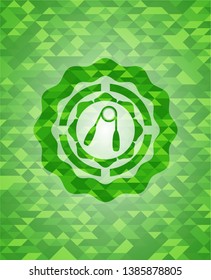 hand gripper icon inside green emblem. Mosaic background