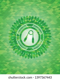 hand gripper icon inside green mosaic emblem