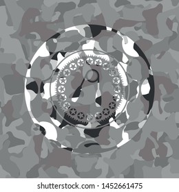 hand gripper icon inside grey camo texture