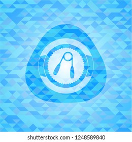 hand gripper icon inside light blue emblem with triangle mosaic background