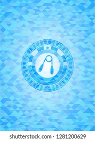 hand gripper icon inside light blue emblem with mosaic background