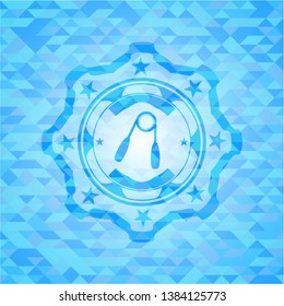 hand gripper icon inside light blue emblem with triangle mosaic background