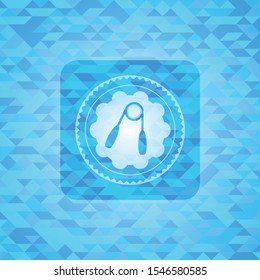 hand gripper icon inside light blue emblem. Mosaic background