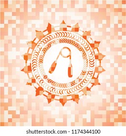 hand gripper icon inside orange mosaic emblem