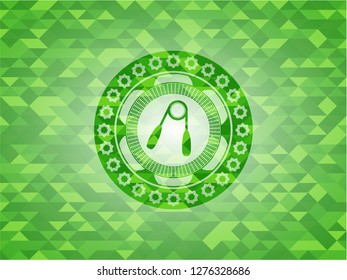 hand gripper icon inside realistic green mosaic emblem