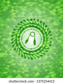 hand gripper icon inside realistic green emblem. Mosaic background