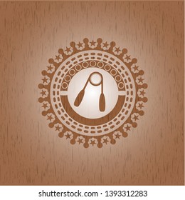 hand gripper icon inside realistic wood emblem