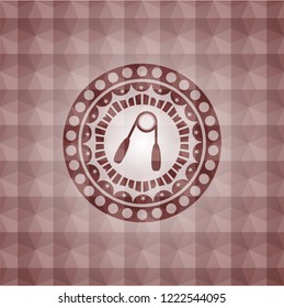 hand gripper icon inside red seamless badge with geometric background.