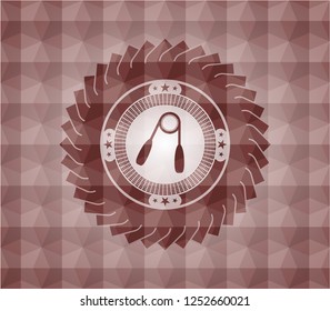 hand gripper icon inside red seamless badge with geometric pattern background.