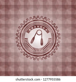 hand gripper icon inside red badge with geometric pattern background. Seamless.