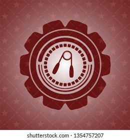 hand gripper icon inside red emblem