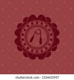 hand gripper icon inside red icon or emblem