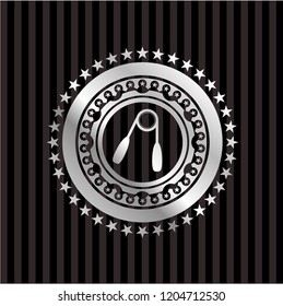 hand gripper icon inside silver badge