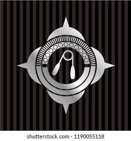 hand gripper icon inside silvery badge or emblem