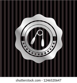 hand gripper icon inside silvery badge or emblem