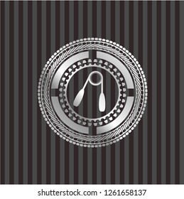 hand gripper icon inside silvery emblem