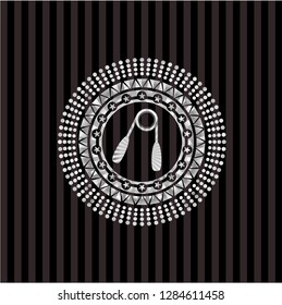 hand gripper icon inside silvery badge