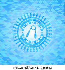 hand gripper icon inside sky blue emblem with triangle mosaic background