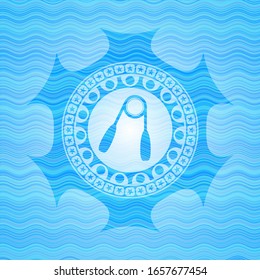 hand gripper icon inside sky blue water emblem.