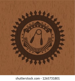 hand gripper icon inside vintage wooden emblem