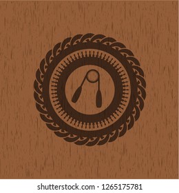 hand gripper icon inside wood emblem. Retro