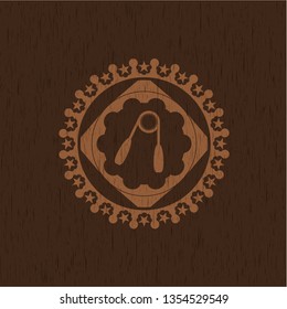 hand gripper icon inside wooden emblem. Vintage.