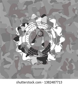 hand gripper icon on grey camouflage pattern