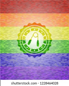hand gripper icon on mosaic background with the colors of the LGBT flag