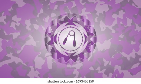hand gripper icon on pink camouflage texture